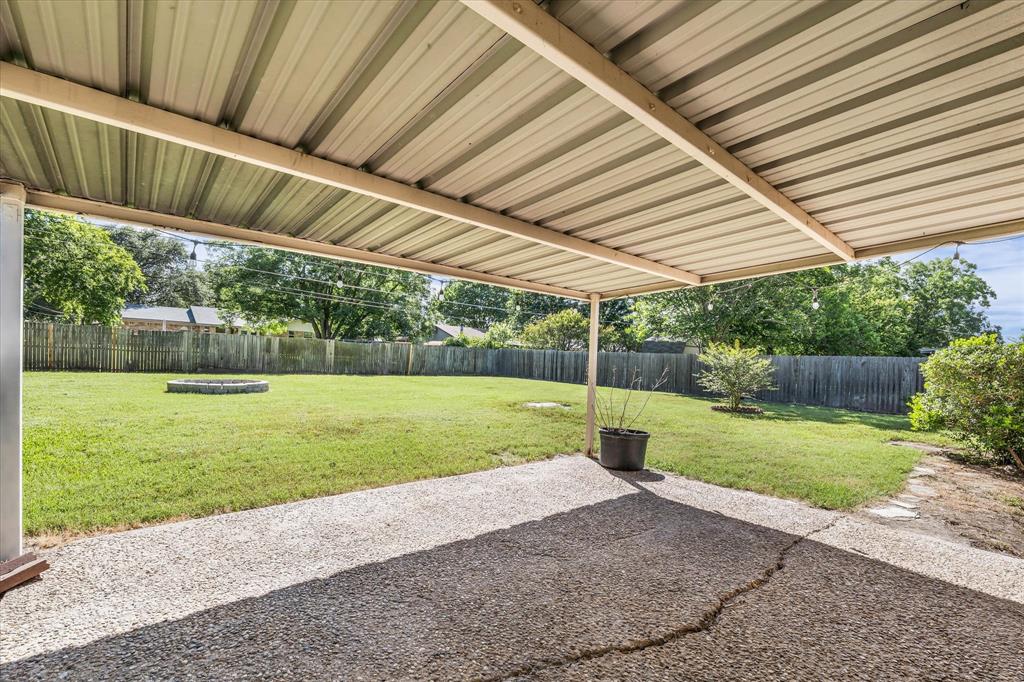 141 Travis Lane Hewitt, TX 76643 - Photo 27 of 31 Covered patio featuring an exposed aggregate concrete surface