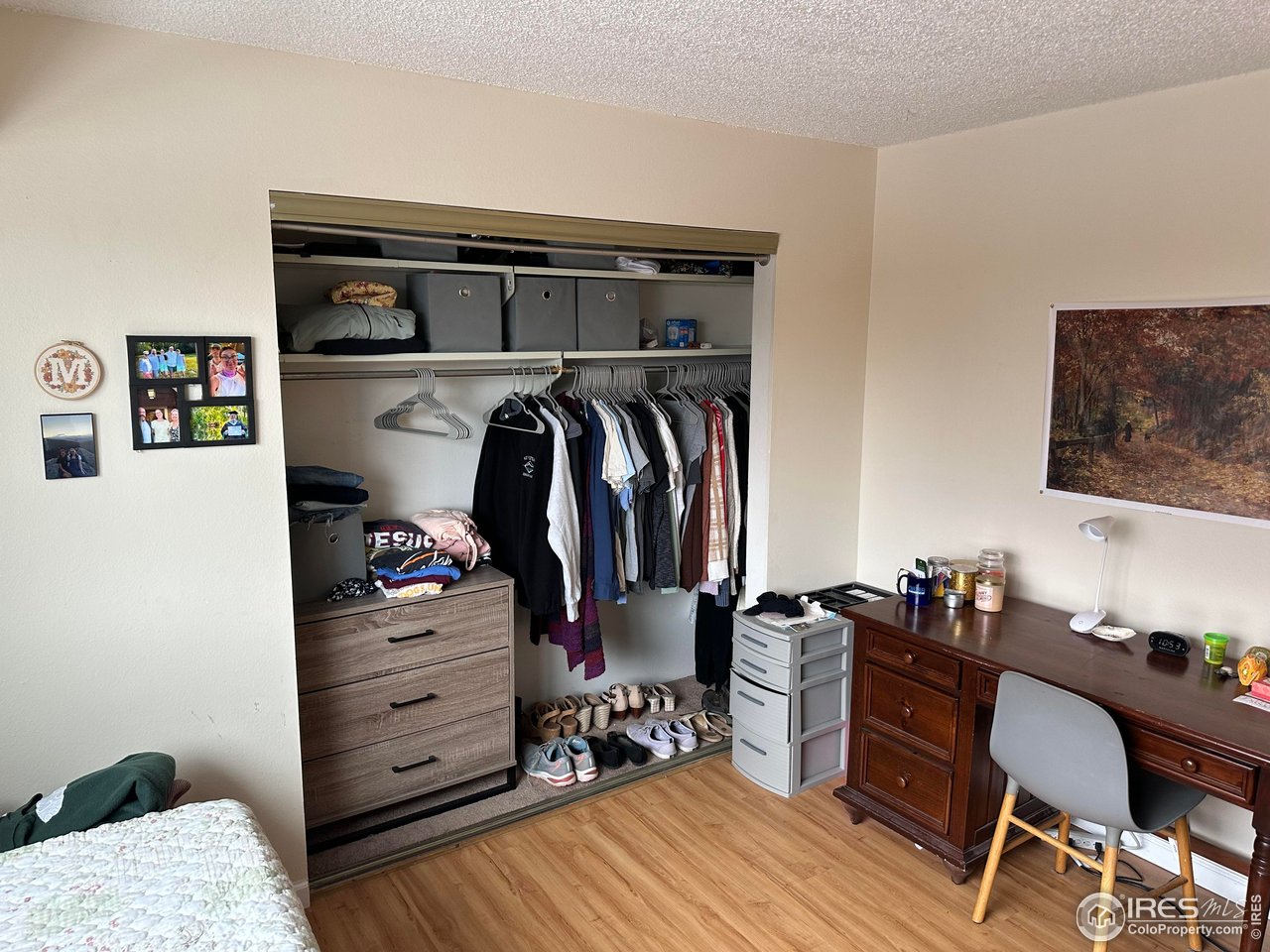 2141 Baseline Road, Unit 18 Boulder, CO 80302 - Photo 11 of 26 a view of walk in closet with clothes and shoes