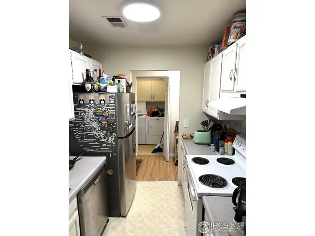 a bathroom with a sink toilet and mirror