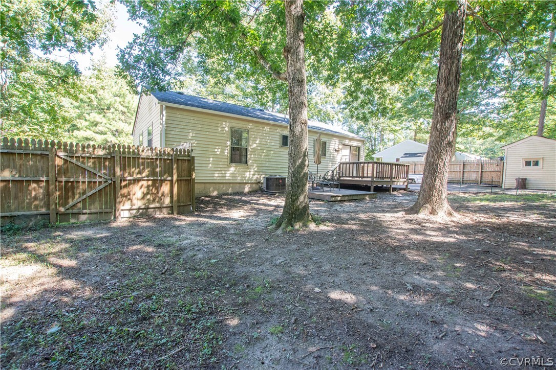 10313 Ridgerun Road Chesterfield, VA 23832 - Photo 18 of 22 a view of a house with backyard