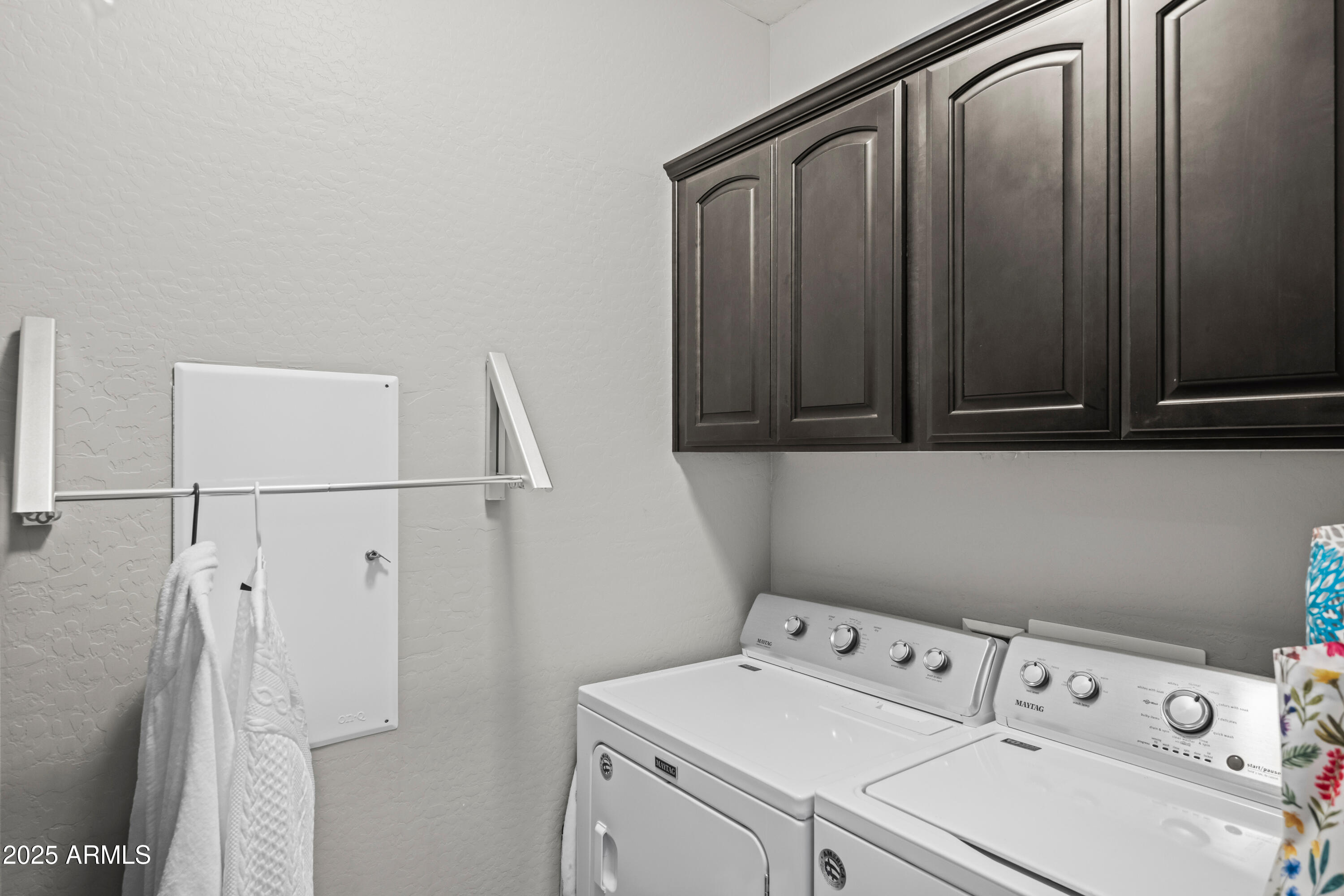 3117 South Signal Butte Road, Unit 474 Mesa, AZ 85212 - Photo 21 of 24 a utility room with dryer and washer