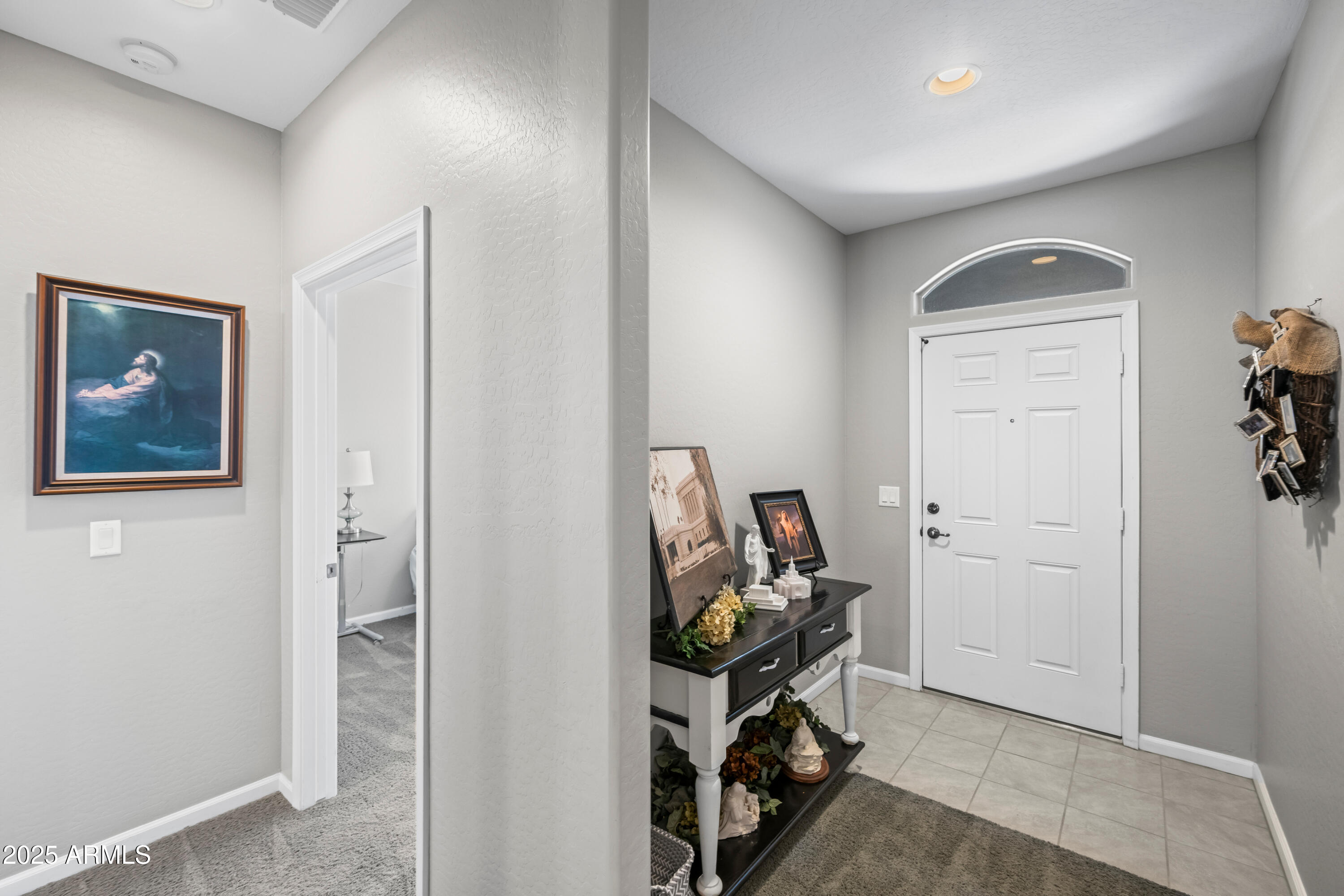 3117 South Signal Butte Road, Unit 474 Mesa, AZ 85212 - Photo 3 of 24 a view of a hallway with workspace and a hallway