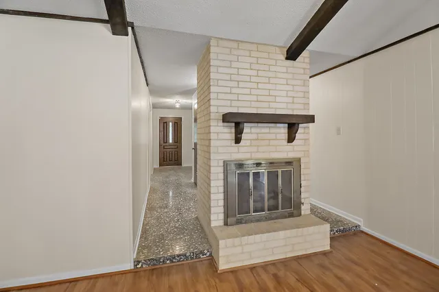 a view of entryway with wooden floor