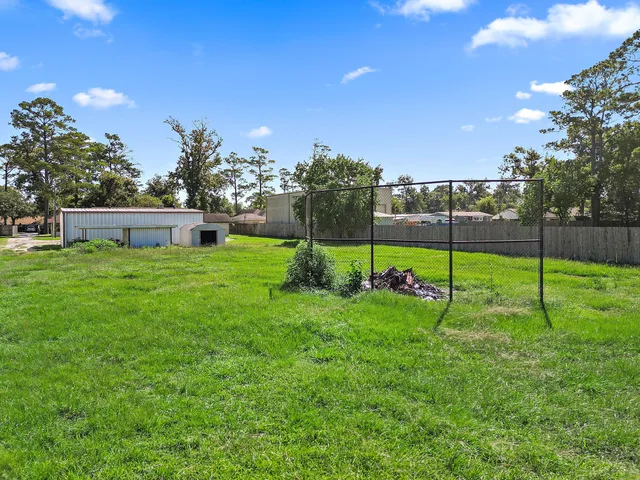 a view of a backyard with a garden