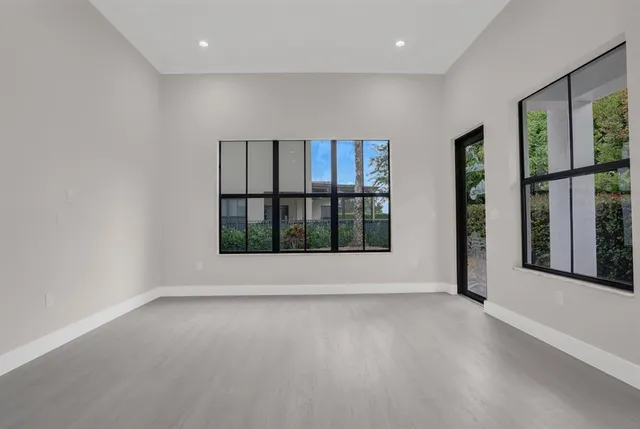 an empty room with windows