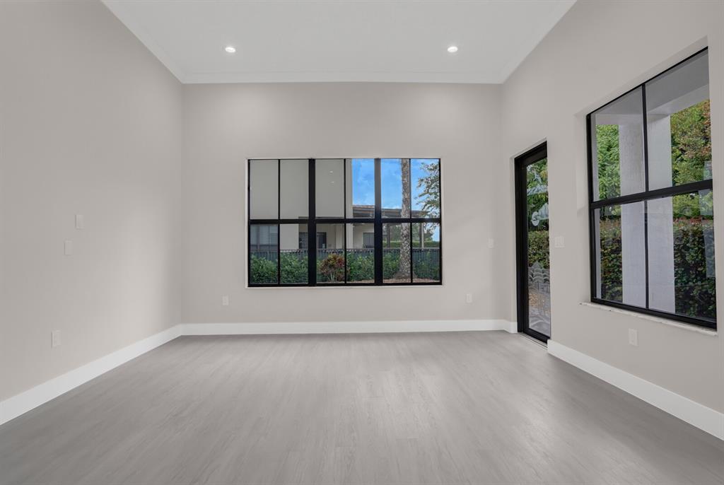 8504 Northwest 37th Court Pembroke Pines, FL 33024 - Photo 14 of 32 an empty room with windows