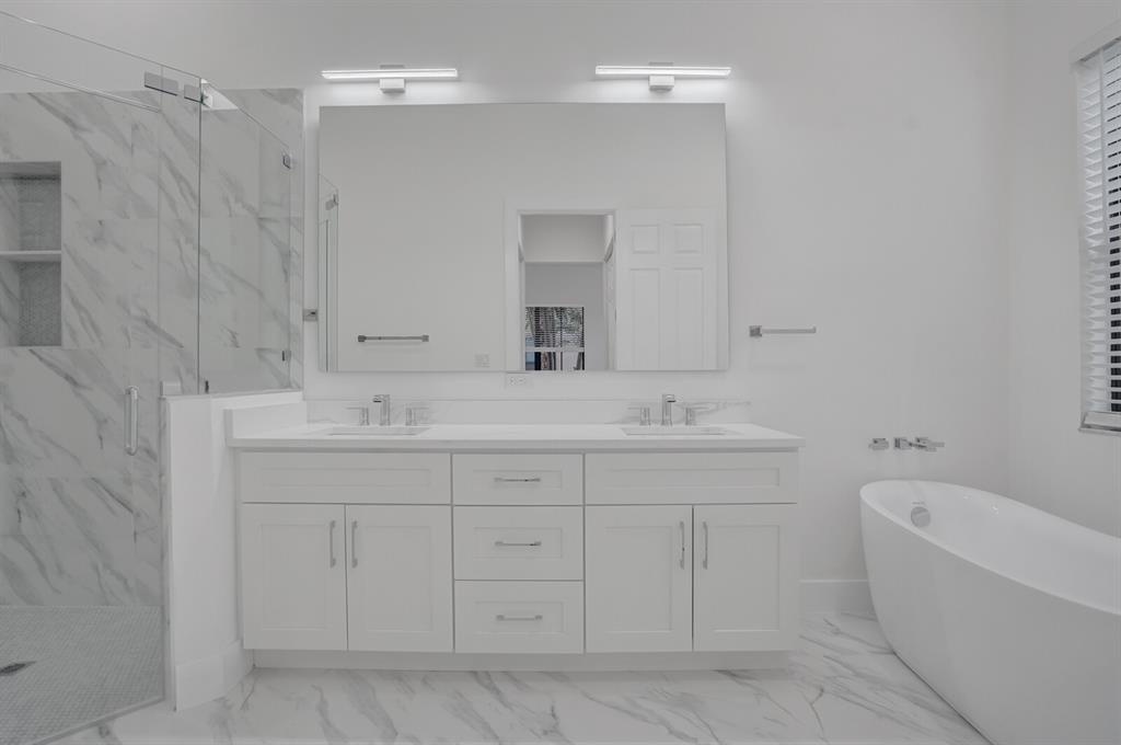 8504 Northwest 37th Court Pembroke Pines, FL 33024 - Photo 18 of 32 a bathroom with a sink a toilet and a bathtub