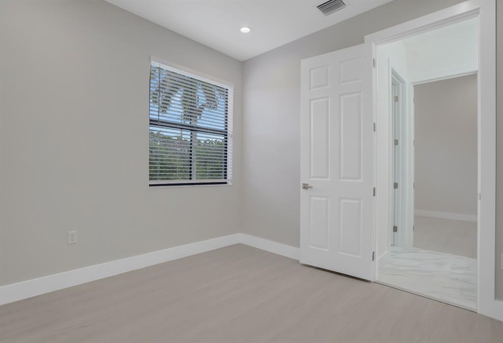 8504 Northwest 37th Court Pembroke Pines, FL 33024 - Photo 20 of 32 an empty room with a window