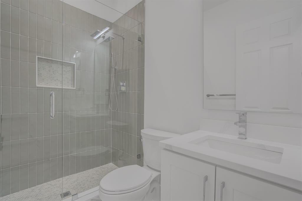 8504 Northwest 37th Court Pembroke Pines, FL 33024 - Photo 26 of 32 a bathroom with a sink toilet and shower