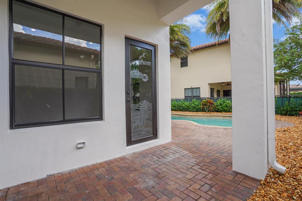 8504 Northwest 37th Court Pembroke Pines, FL 33024 - Photo 28 of 32 a view of a small space with wooden floor and a window