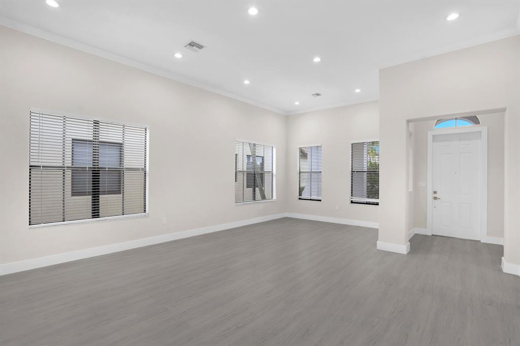 8504 Northwest 37th Court Pembroke Pines, FL 33024 - Photo 7 of 32 a view of an empty room with a window