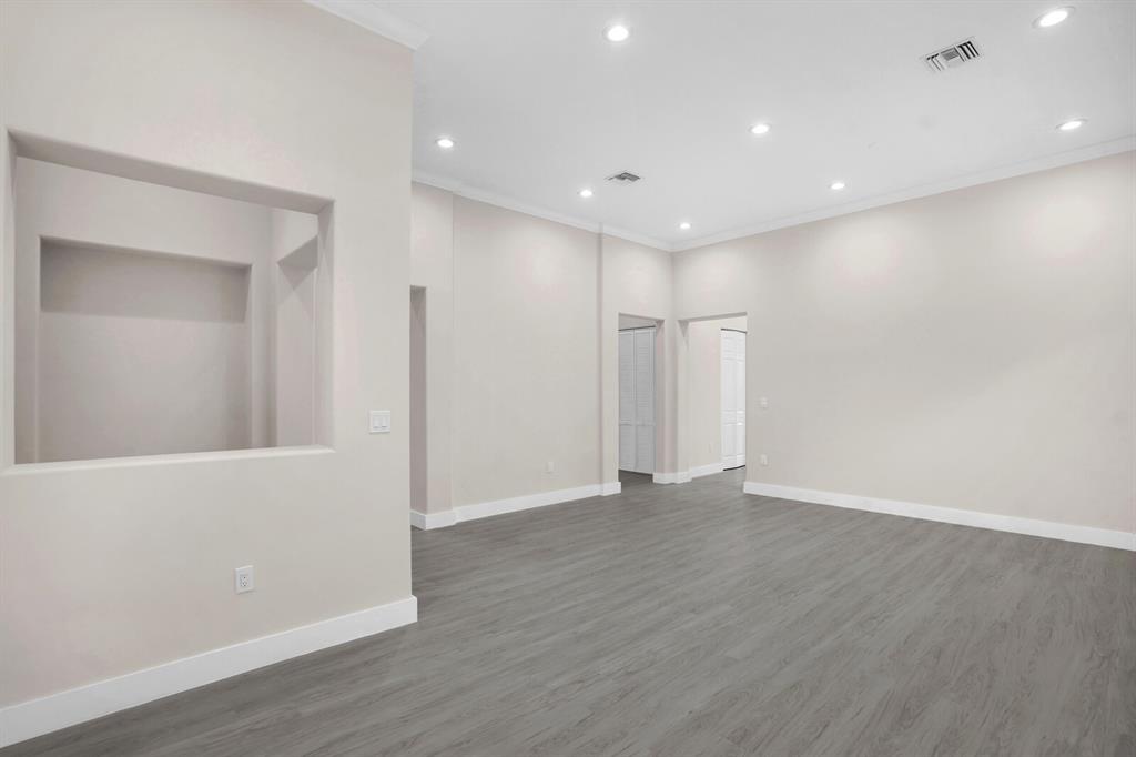 8504 Northwest 37th Court Pembroke Pines, FL 33024 - Photo 9 of 32 a view of an empty room with wooden floor