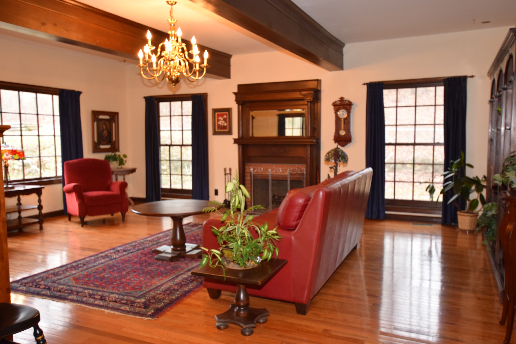 1329 Fall River Road Goodspring, TN 38460 - Photo 11 of 30 a living room with furniture and a chandelier