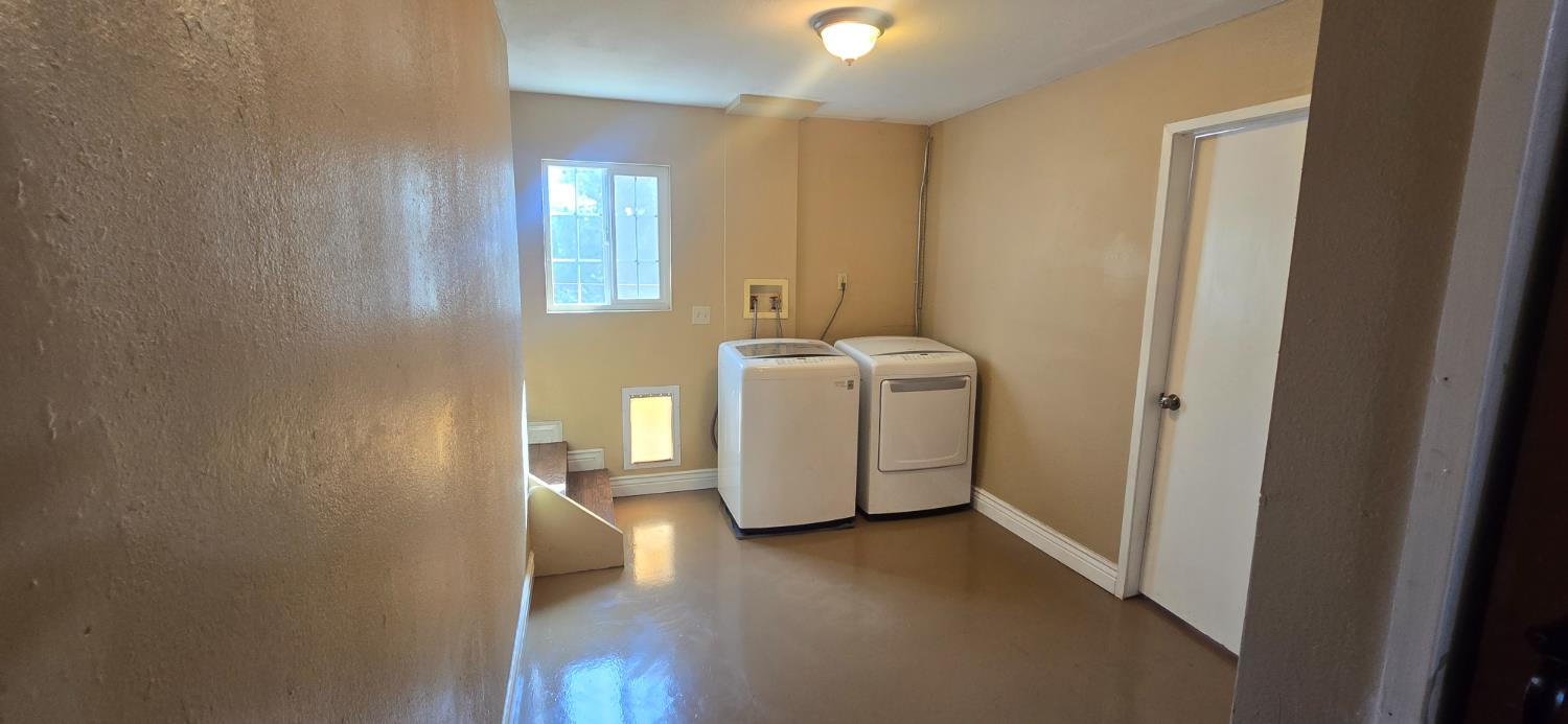 3091 Sand Ridge Road Placerville, CA 95667 - Photo 36 of 51 a utility room with dryer and washer