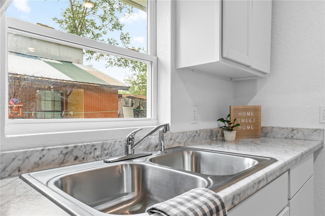 809 East Downs Avenue Temple, TX 76501 - Photo 10 of 24 a close view of sink and tap