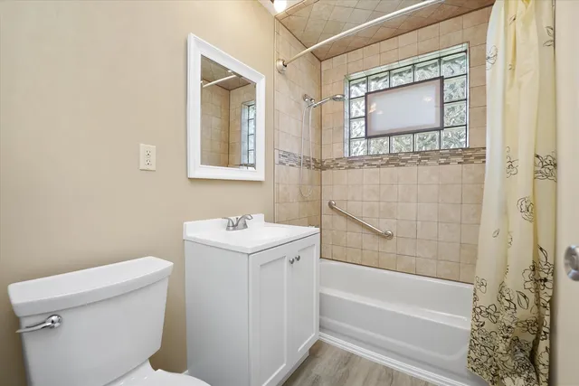 a bathroom with a toilet sink and a bathtub