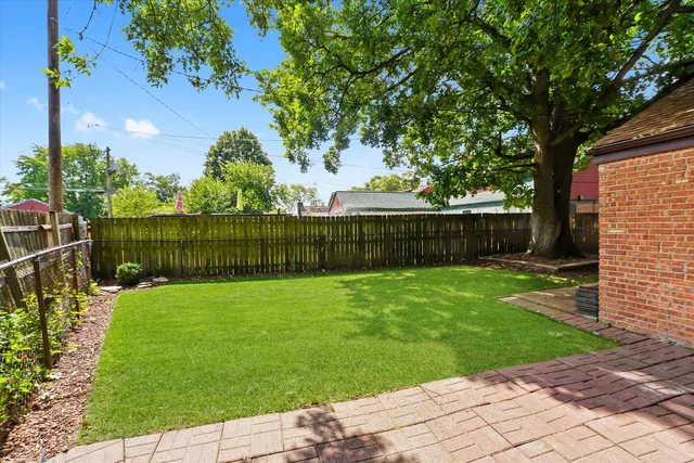 a view of a backyard with a garden