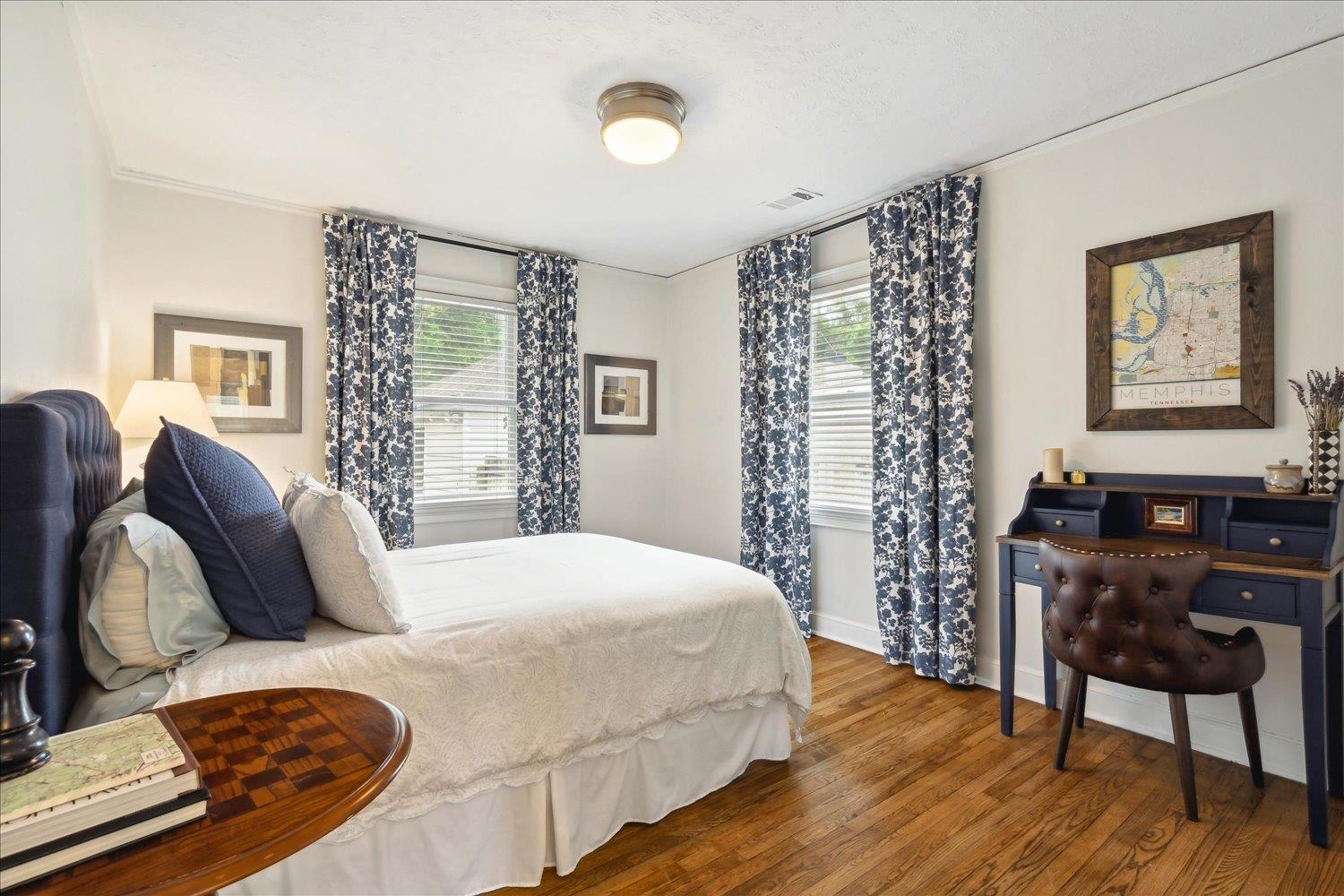 3569 Aurora Circle Memphis, TN 38111 - Photo 19 of 23 a bedroom with a bed and wooden floor