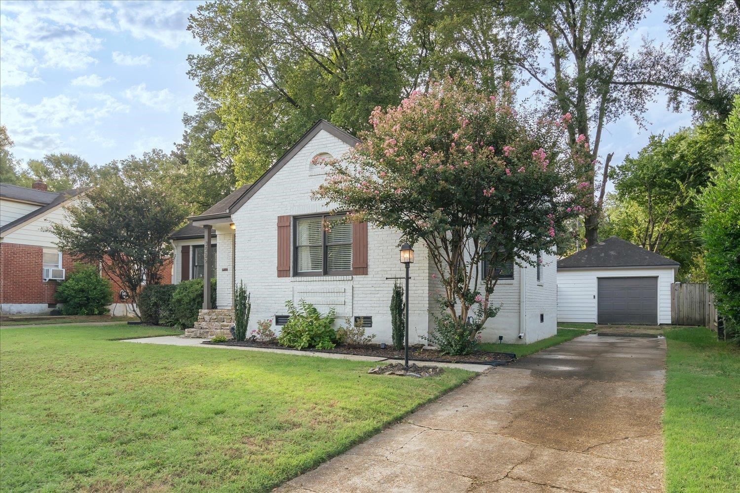 3569 Aurora Circle Memphis, TN 38111 - Photo 2 of 23 a front view of house with yard and green space