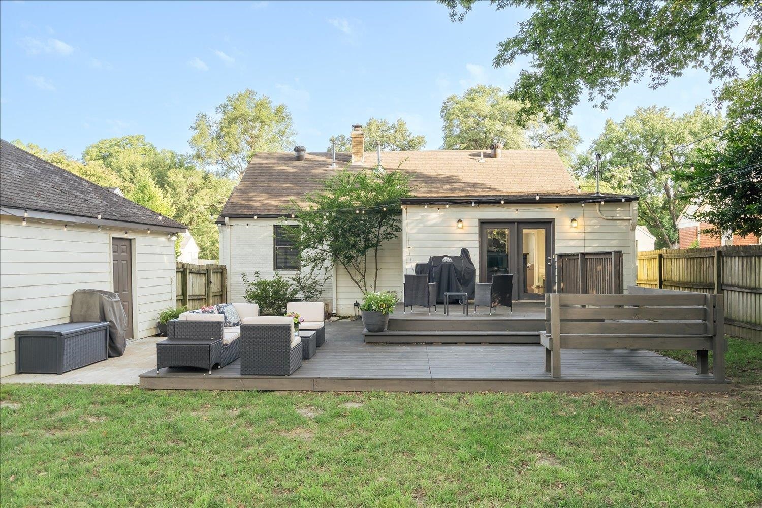 3569 Aurora Circle Memphis, TN 38111 - Photo 23 of 23 a view of a house with backyard sitting area and garden