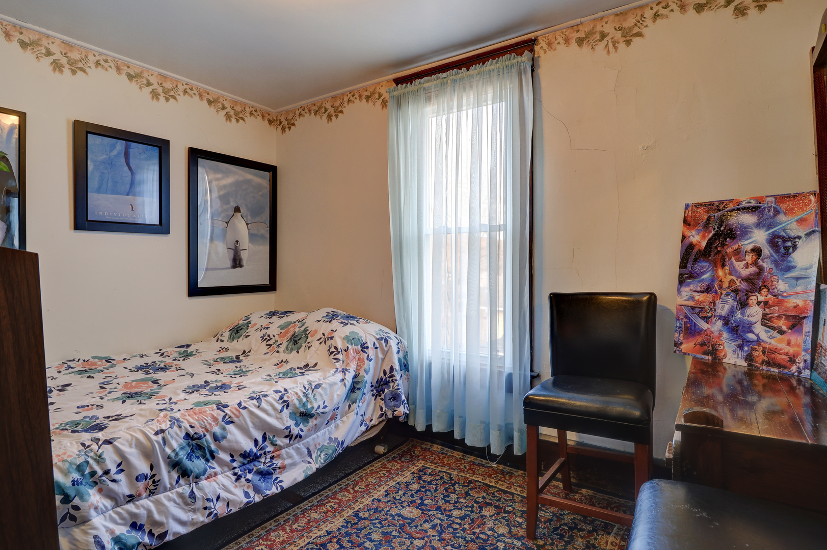 700 North 3rd Street Clinton, IA 52732 - Photo 17 of 30 a bedroom with a bed and a flat screen tv