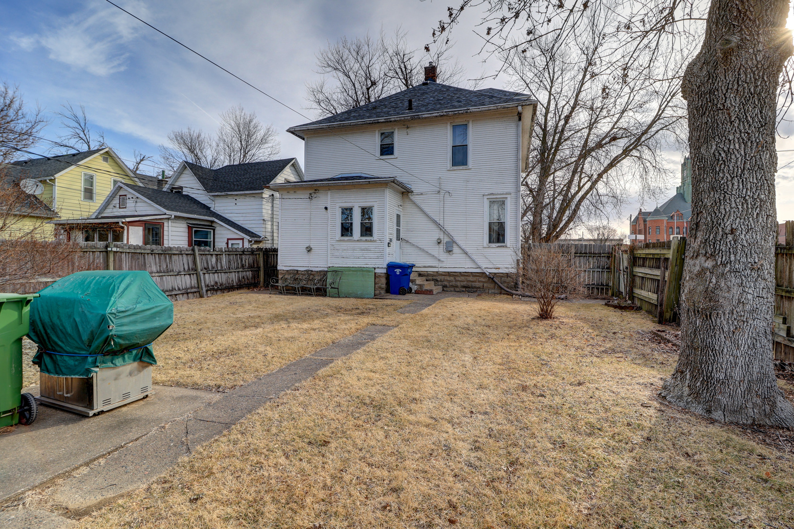 700 North 3rd Street Clinton, IA 52732 - Photo 24 of 30 a view of a house with a yard