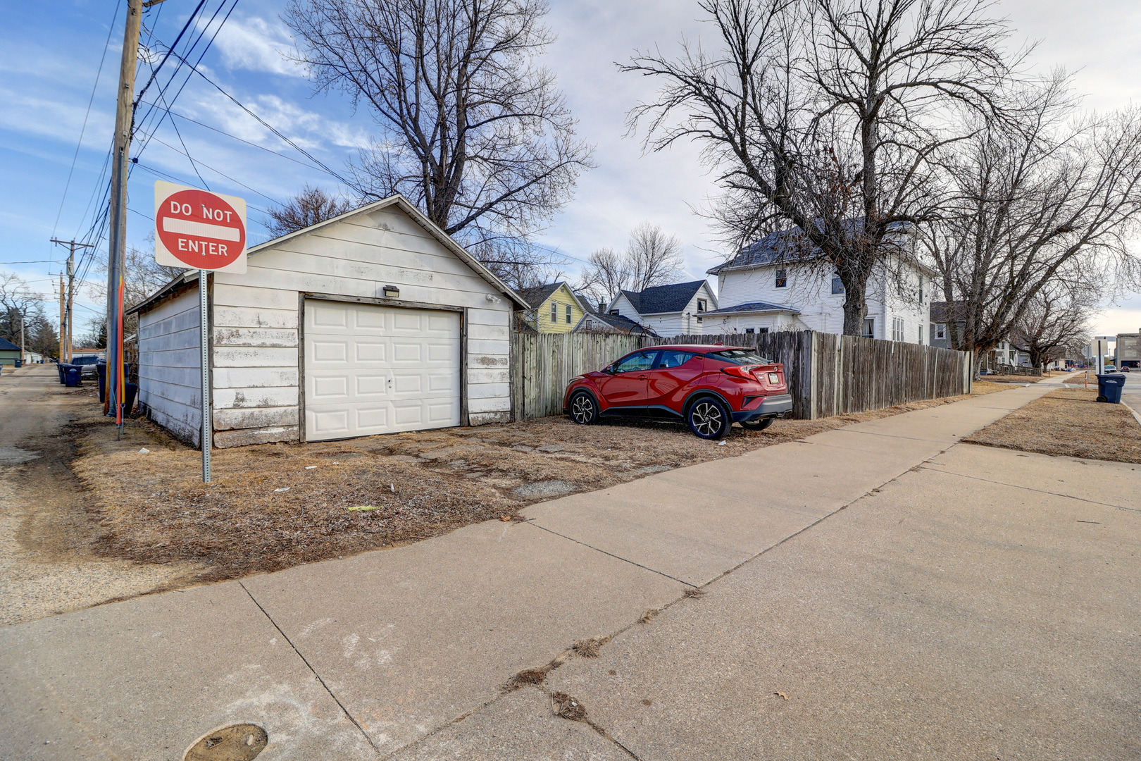 700 North 3rd Street Clinton, IA 52732 - Photo 25 of 30 a car parked in front of a house