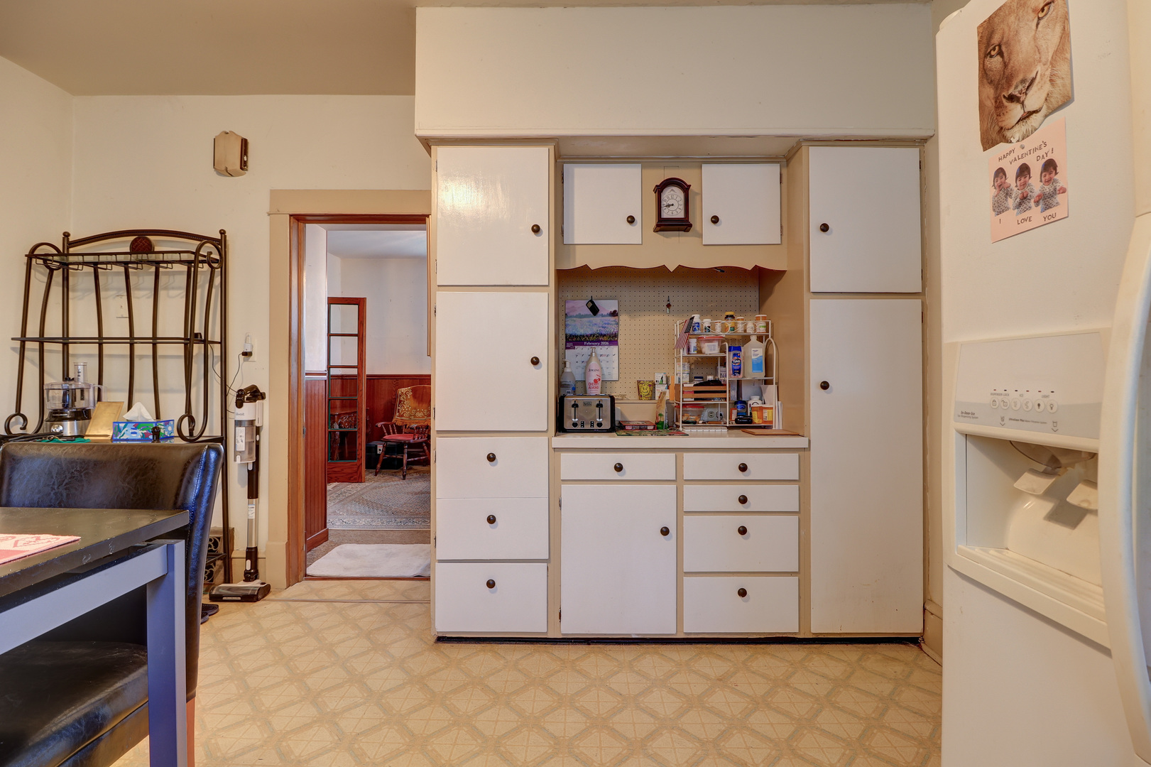700 North 3rd Street Clinton, IA 52732 - Photo 8 of 30 a kitchen with cabinets a washer and dryer
