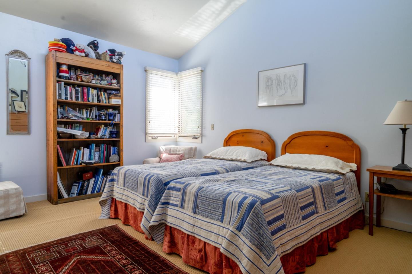 278 Corral De Tierra Road Salinas, CA 93908 - Photo 24 of 38 a bedroom with two beds and a book shelf