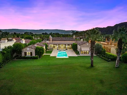 a view of a big yard with a houses