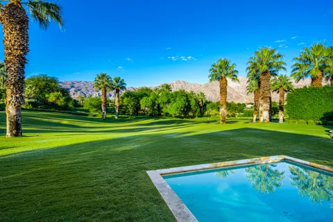 a view of a golf course with a garden