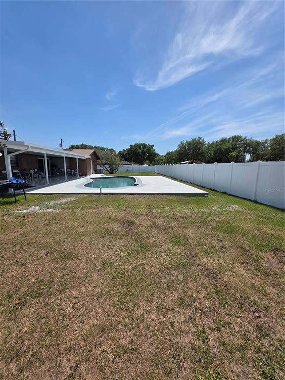 4821 Platt Road Plant City, FL 33565 - Photo 34 of 49 a view of a swimming pool and an outdoor seating