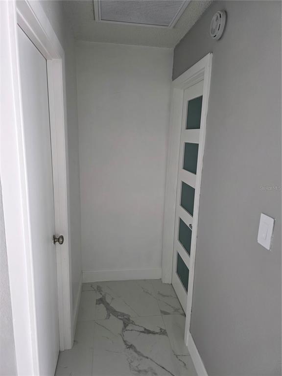 4821 Platt Road Plant City, FL 33565 - Photo 9 of 49 an empty room with a closet