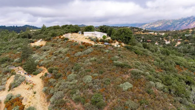 a view of mountains and mountain in the background