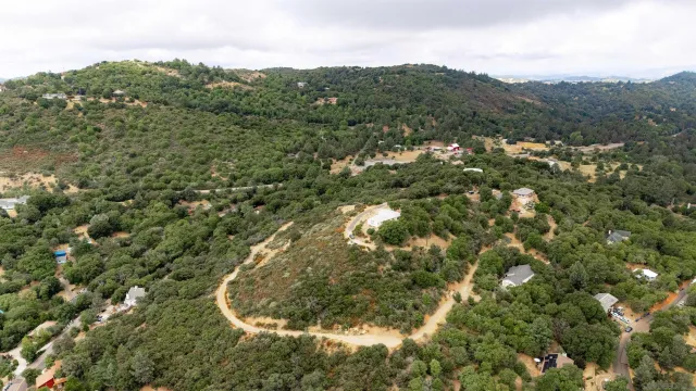 a view of a city with mountains