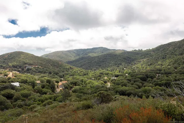 a view of a city and mountains