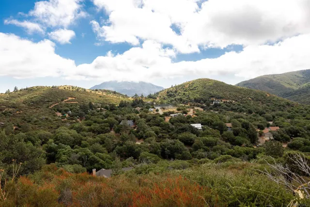 a view of a city and mountains