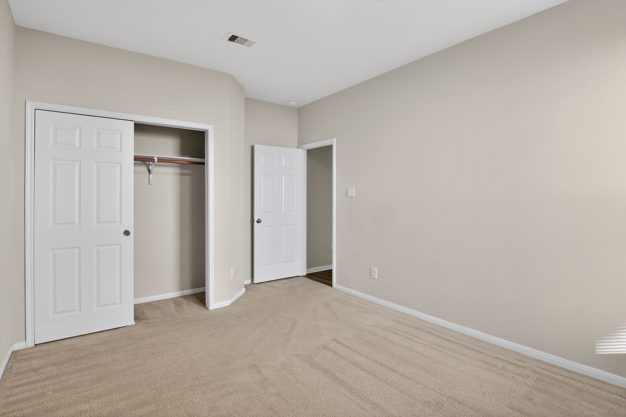 4938 Yearling Ridge Court Katy, TX 77449 - Photo 20 of 29 a view of an empty room with closet and a window