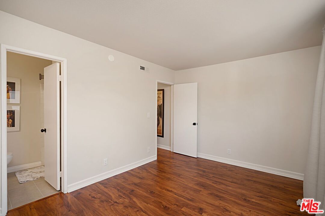 7774 Vía Rosa Maria Burbank, CA 91504 - Photo 12 of 22 wooden floor in an empty room