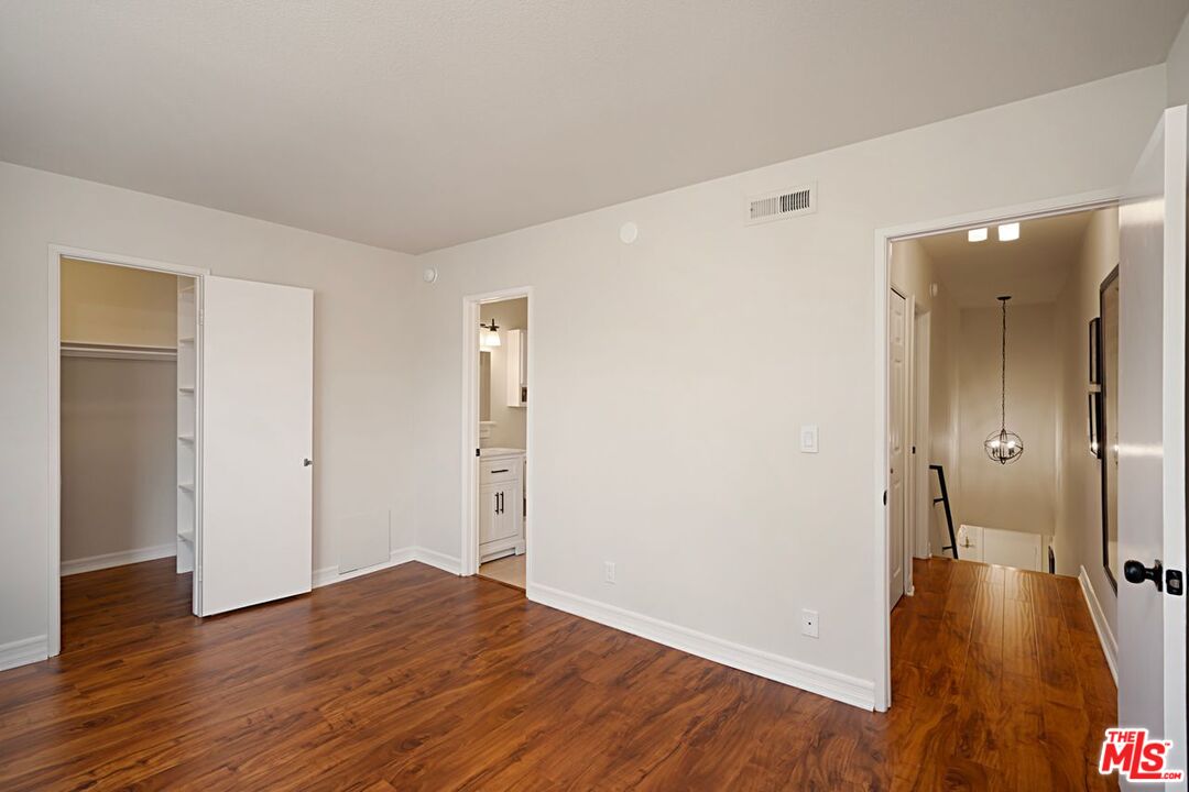 7774 Vía Rosa Maria Burbank, CA 91504 - Photo 18 of 22 a view of a room with wooden floor