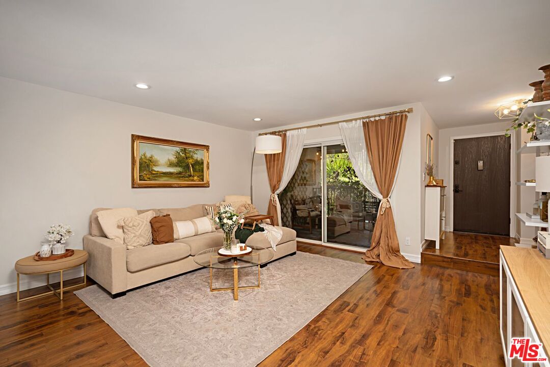 7774 Vía Rosa Maria Burbank, CA 91504 - Photo 2 of 22 a living room with furniture and a wooden floor