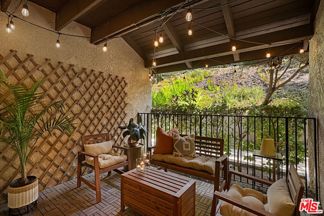 7774 Vía Rosa Maria Burbank, CA 91504 - Photo 10 of 22 a view of a chairs and table on the deck