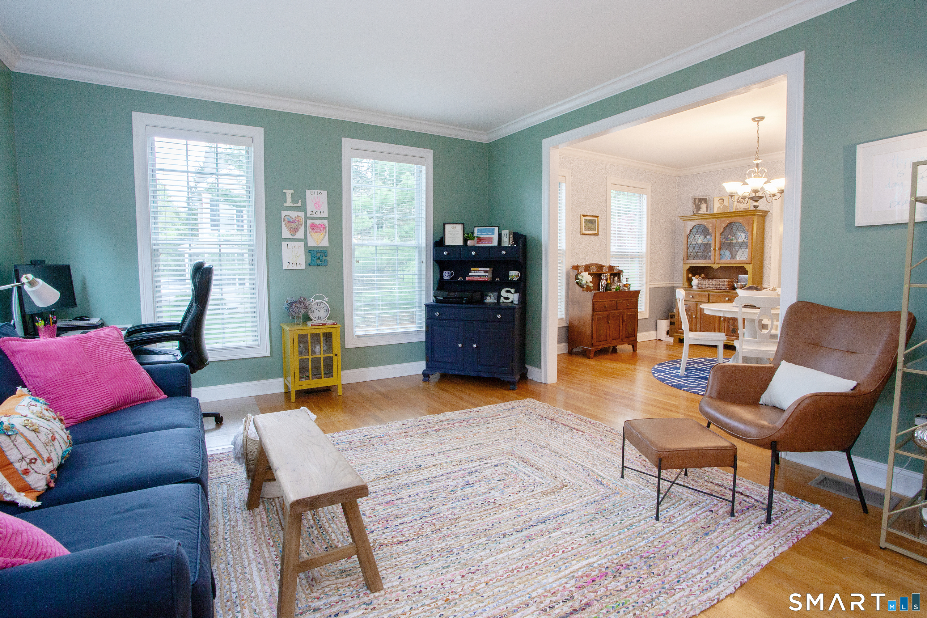 490 New Road Avon, CT 06001 - Photo 11 of 30 a living room with furniture and a wooden floor
