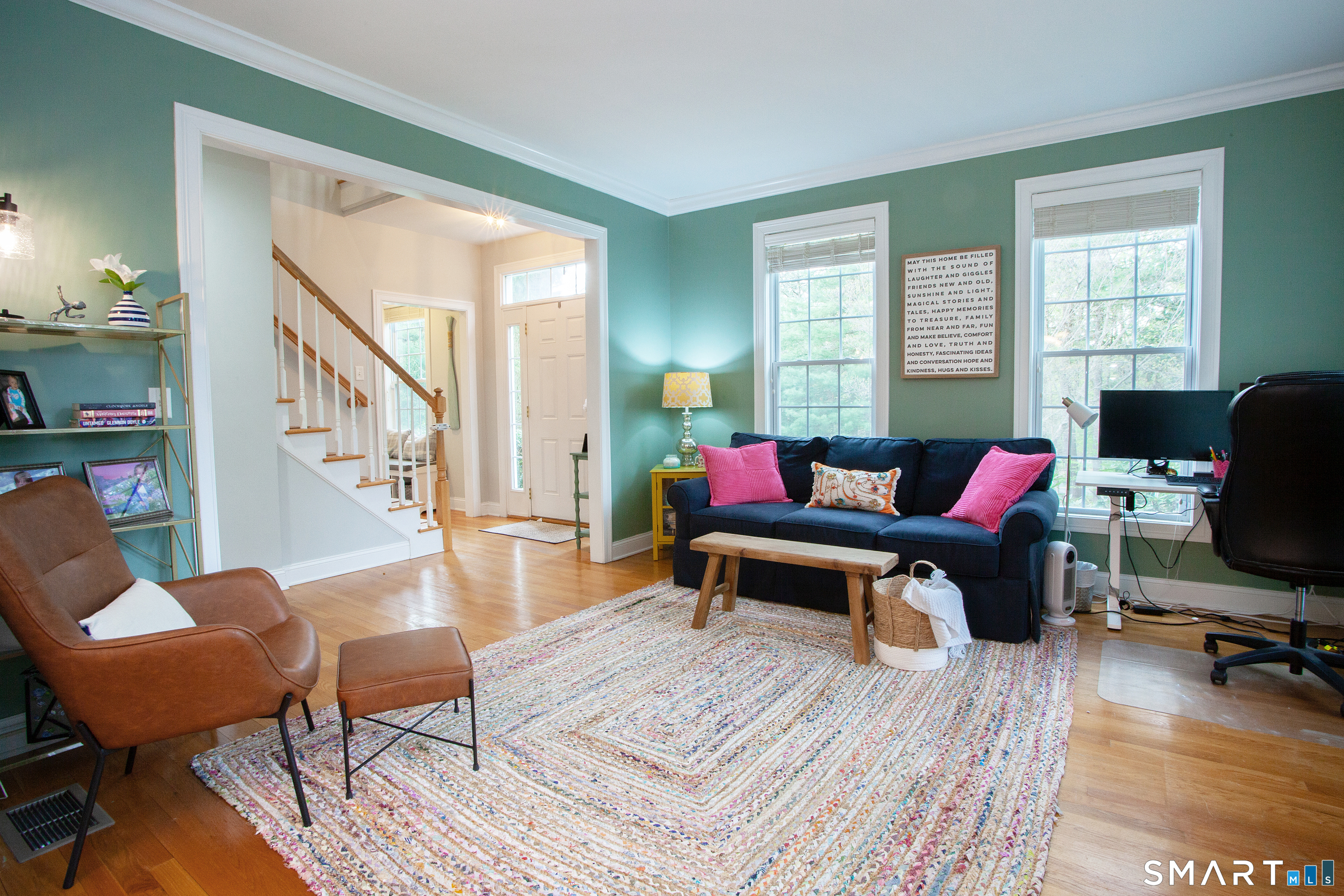 490 New Road Avon, CT 06001 - Photo 12 of 30 a living room with furniture a rug and a window