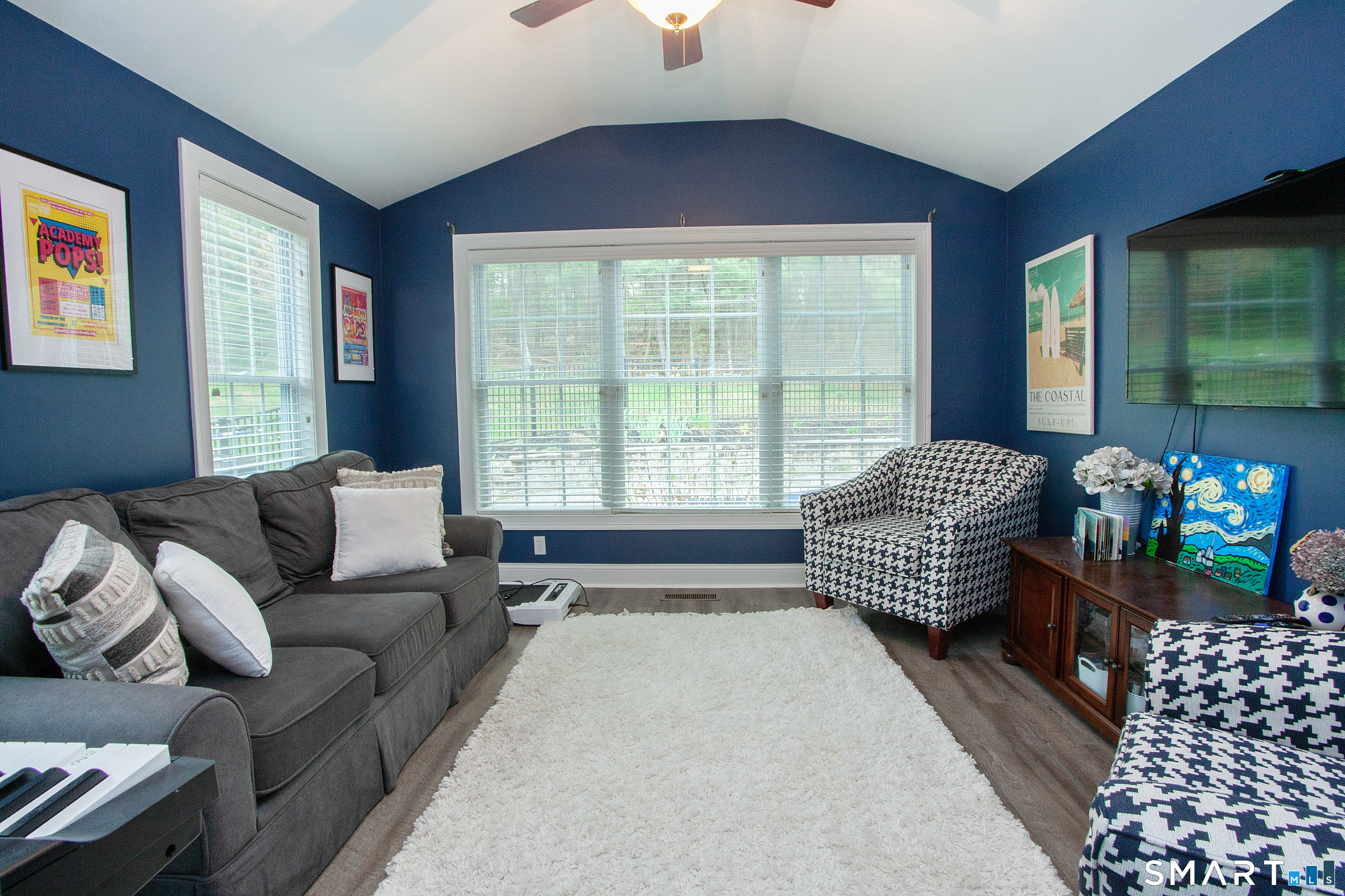 490 New Road Avon, CT 06001 - Photo 14 of 30 a living room with furniture and a large window