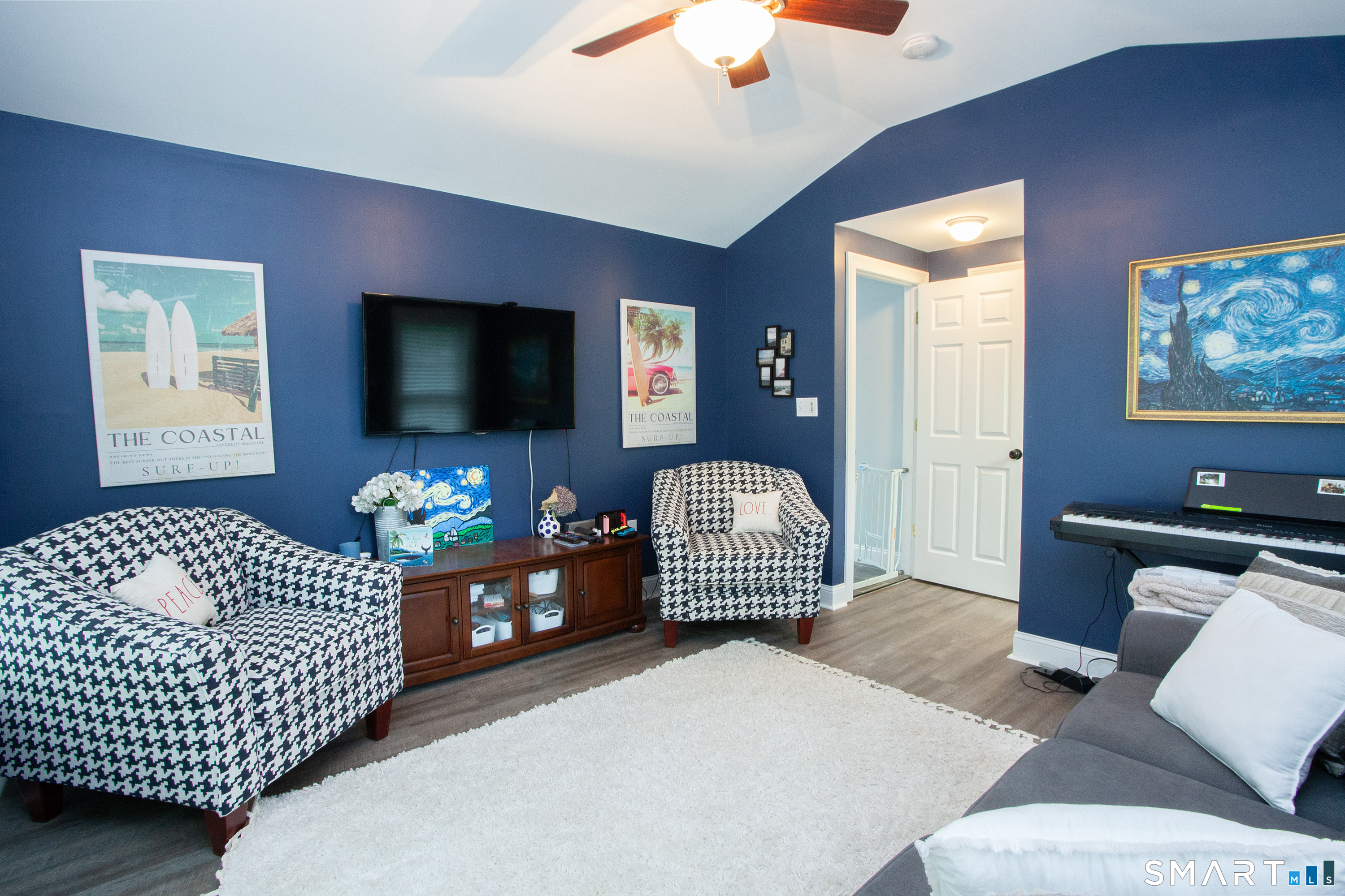 490 New Road Avon, CT 06001 - Photo 15 of 30 a living room with furniture and a flat screen tv