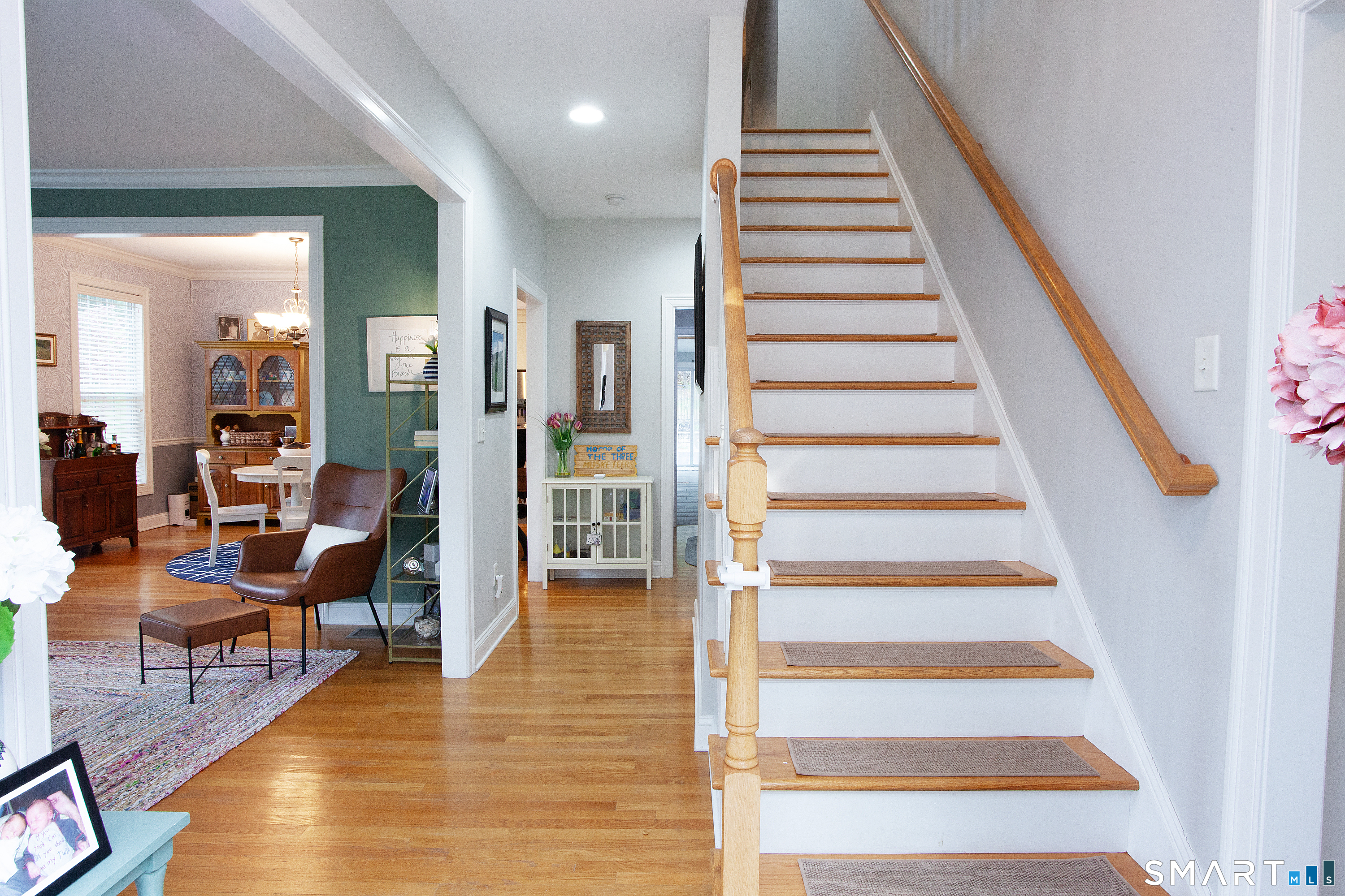 490 New Road Avon, CT 06001 - Photo 16 of 30 a view of entryway and hall with wooden floor