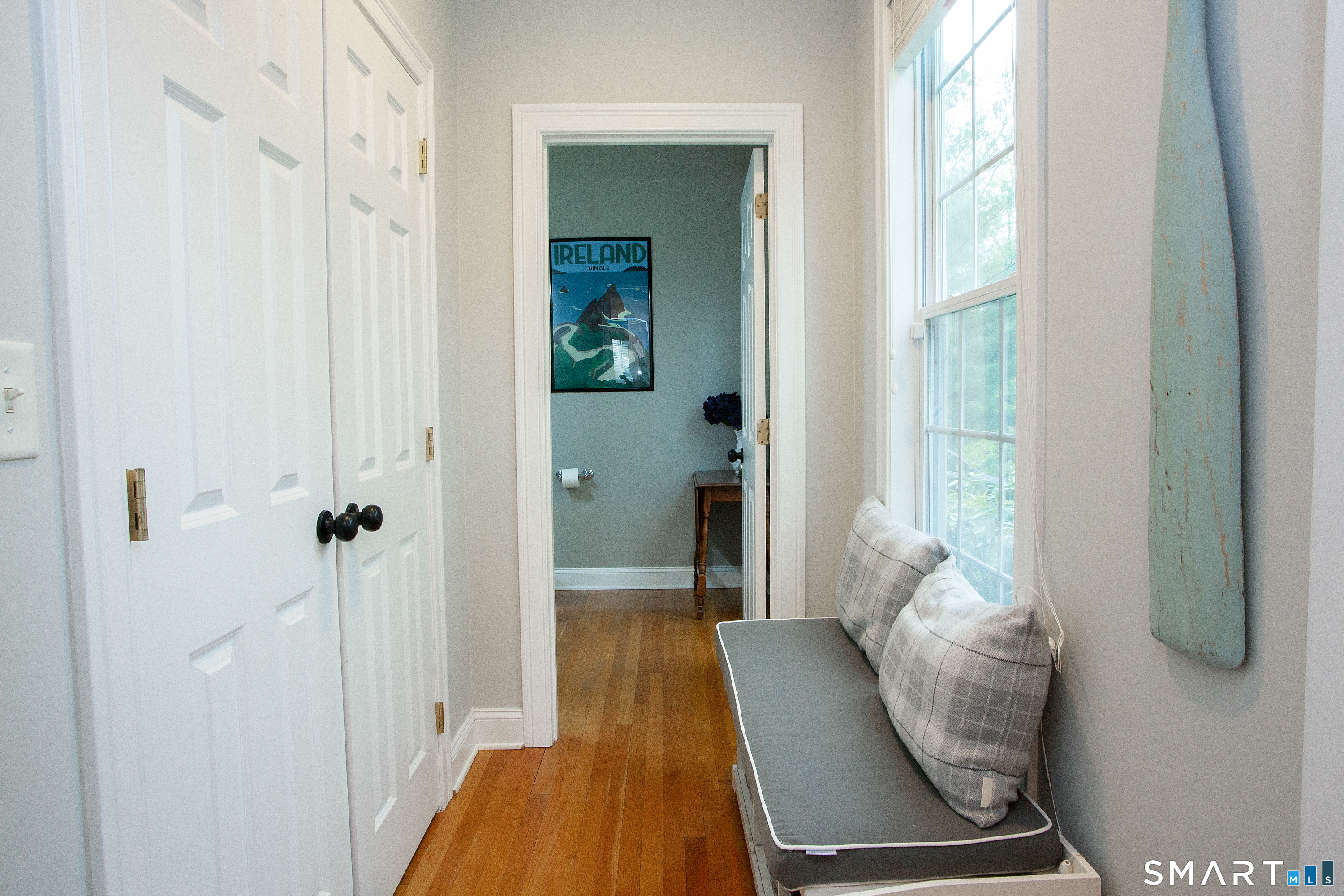 490 New Road Avon, CT 06001 - Photo 17 of 30 a room with a table and a potted plant