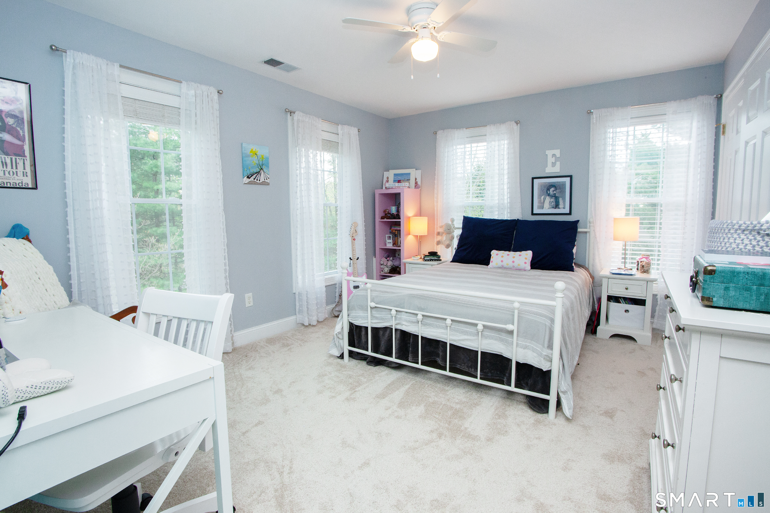 490 New Road Avon, CT 06001 - Photo 25 of 30 a bedroom with a bed and a table in it