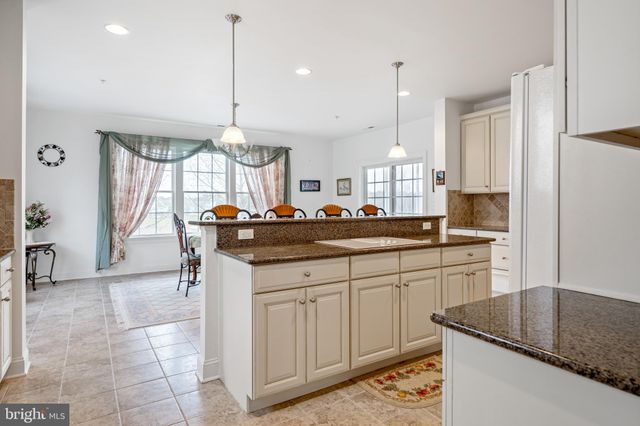 $624,999 | 38415 Boxwood Terrace, Unit 201B, Selbyville, DE 19975